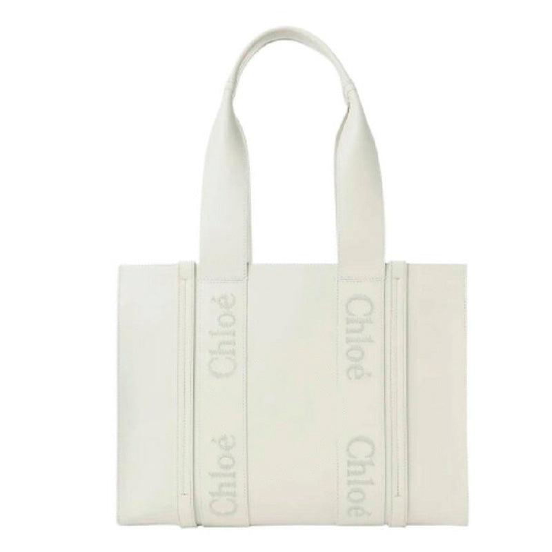 Bolsa Shopper Woody Logo - Mercado de Luxo - O Maior E-Commerce de Bens, Produtos e Serviços de Luxo do Brasil.