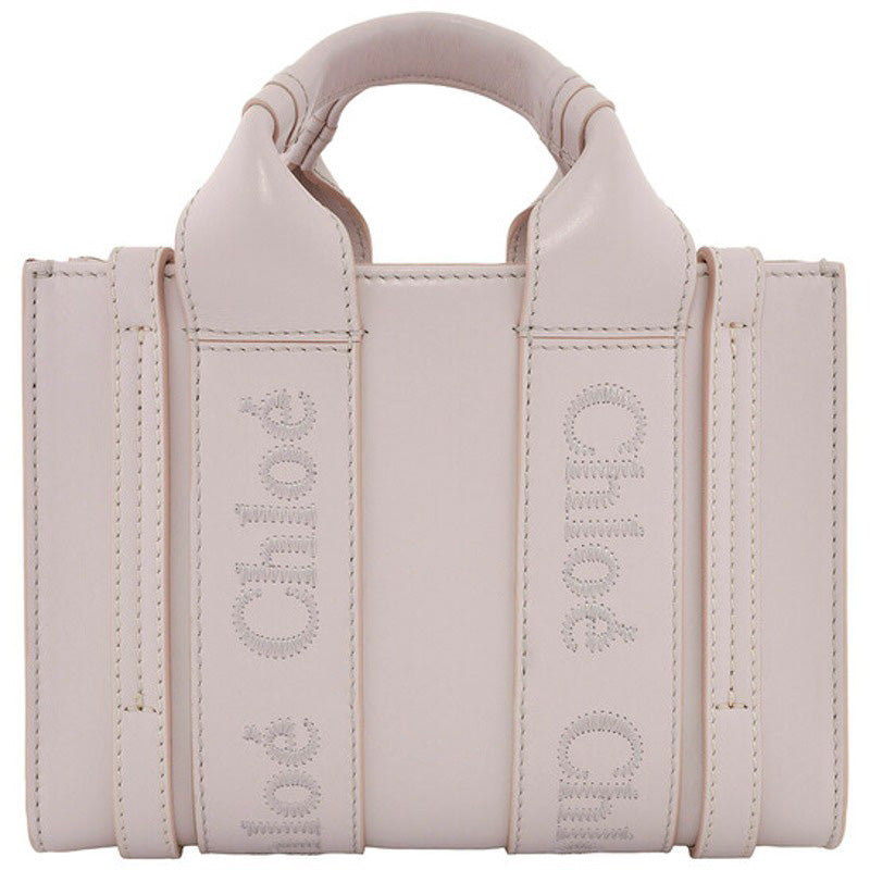 Bolsa Shopper Woody Logo Mini - Mercado de Luxo - O Maior E-Commerce de Bens, Produtos e Serviços de Luxo do Brasil.