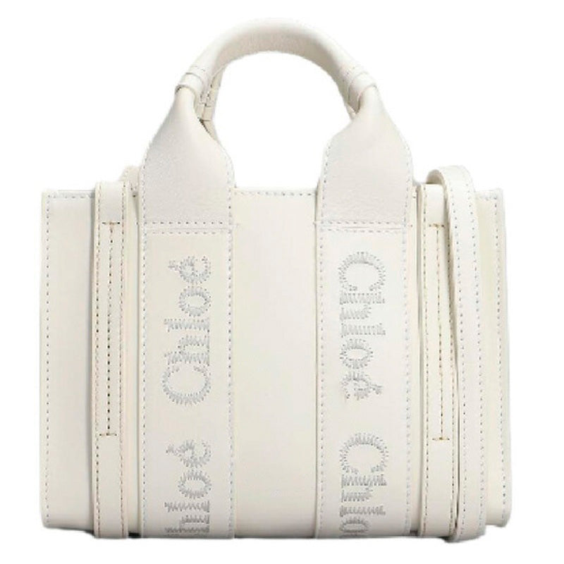 Bolsa Shopper Mini Woody - Mercado de Luxo - O Maior E-Commerce de Bens, Produtos e Serviços de Luxo do Brasil.