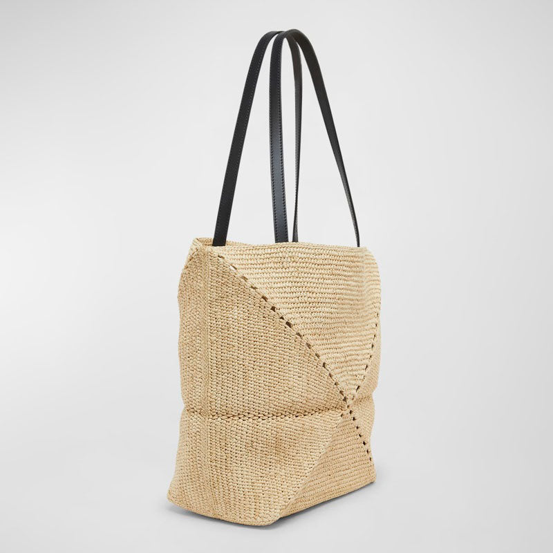 Bolsa Shopper x Paula’s Ibiza Medium Puzzle Fold in Raffia with s - Mercado de Luxo - O Maior E-Commerce de Bens, Produtos e Serviços de Luxo do Brasil.