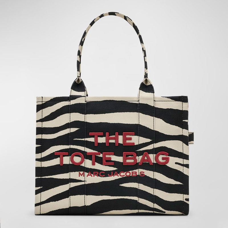 Bolsa Shopper The Zebra Canvas Large - Mercado de Luxo - O Maior E-Commerce de Bens, Produtos e Serviços de Luxo do Brasil.