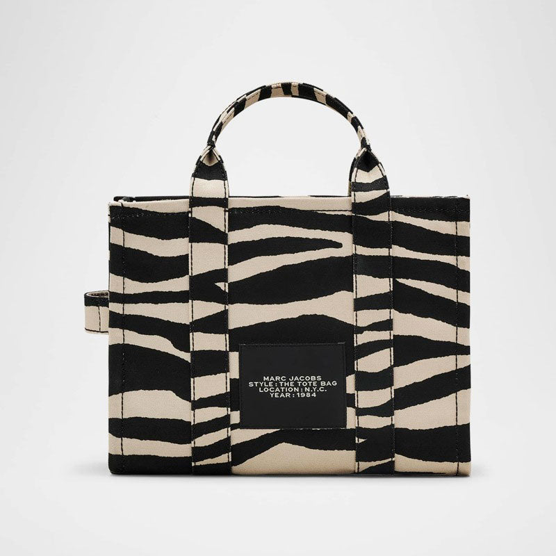 Bolsa Shopper The Zebra Canvas Medium - Mercado de Luxo - O Maior E-Commerce de Bens, Produtos e Serviços de Luxo do Brasil.