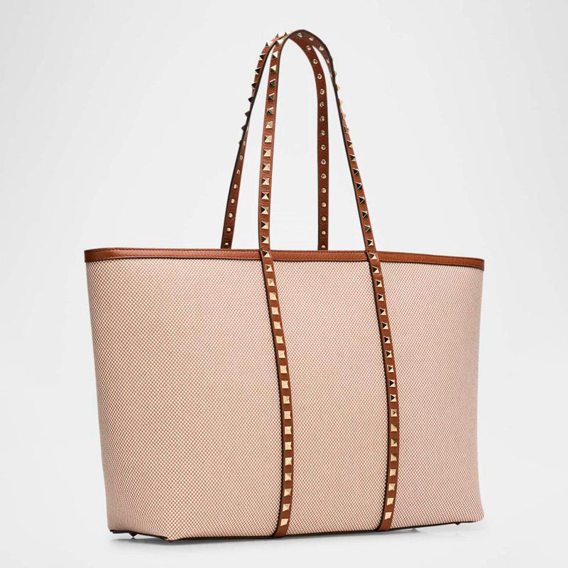 Bolsa Shopper Rockstud Medium Canvas - Mercado de Luxo - O Maior E-Commerce de Bens, Produtos e Serviços de Luxo do Brasil.