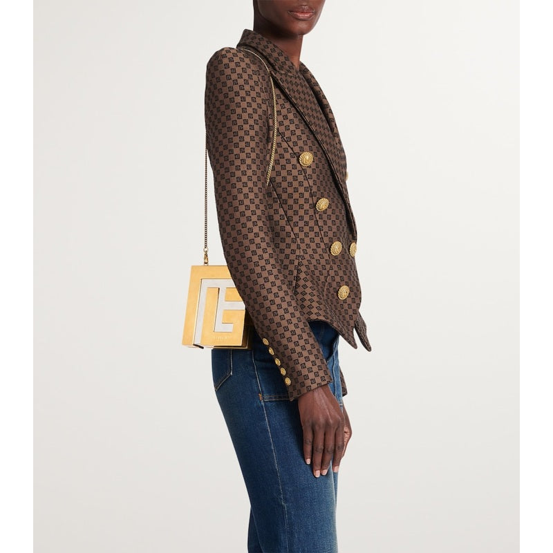 Bolsa Clutch Metal Monogram