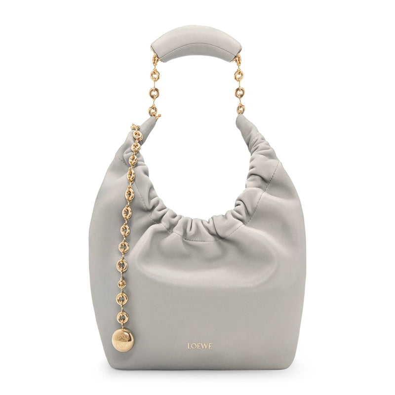 Bolsa Handle Small Squeeze - Mercado de Luxo - O Maior E-Commerce de Bens, Produtos e Serviços de Luxo do Brasil.