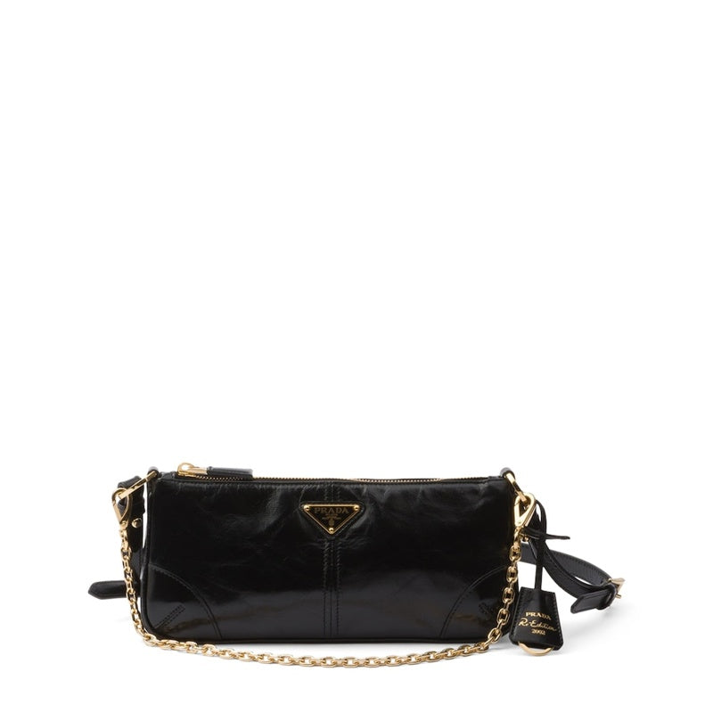 Bolsa Shoulder Medium Re-Edition 2002 - Mercado de Luxo - O Maior E-Commerce de Bens, Produtos e Serviços de Luxo do Brasil.