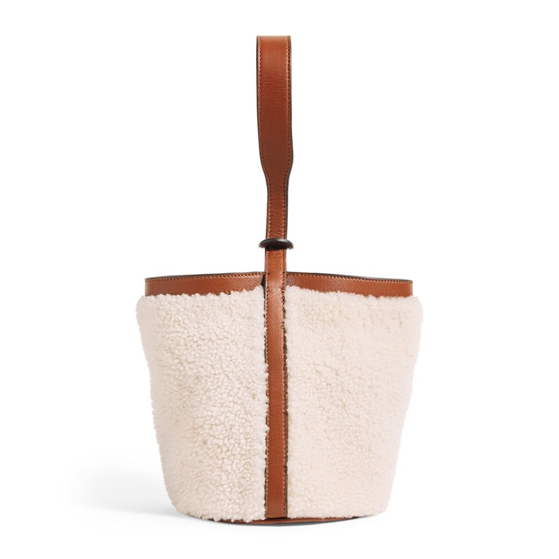 Bolsa Bucket Shearling- - Mercado de Luxo - O Maior E-Commerce de Bens, Produtos e Serviços de Luxo do Brasil.