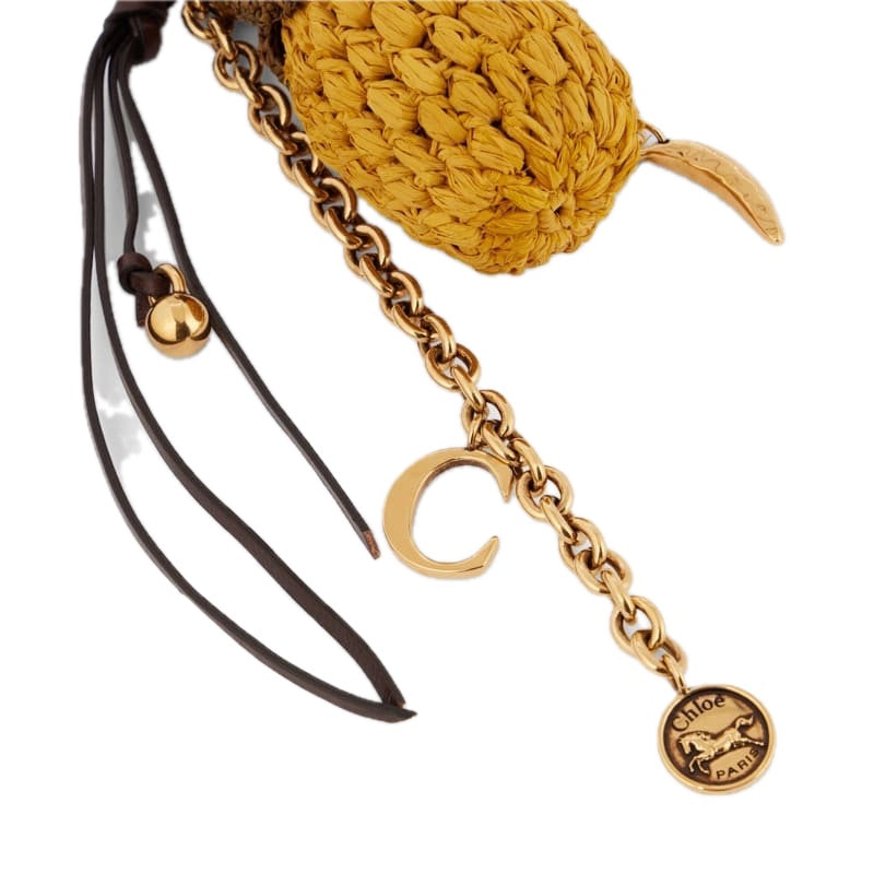 Charms e Acessórios Pingente de bolsa com acabamento em ráfia