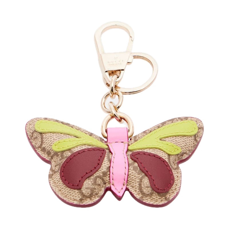 Charms e Acessórios Pingente de bolsa de lona revestida com acabamento em couro GG - Mercado de Luxo - O Maior E-Commerce de Bens, Produtos e Serviços de Luxo do Brasil.