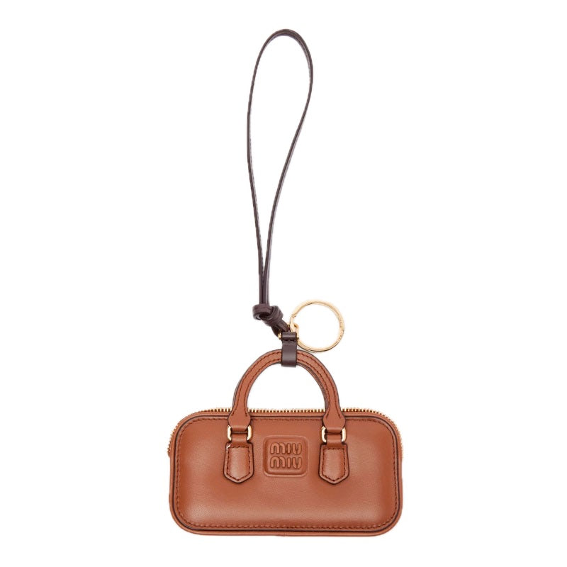 Charms e Acessórios Pingente de bolsa de couro Arcadie - Mercado de Luxo - O Maior E-Commerce de Bens, Produtos e Serviços de Luxo do Brasil.