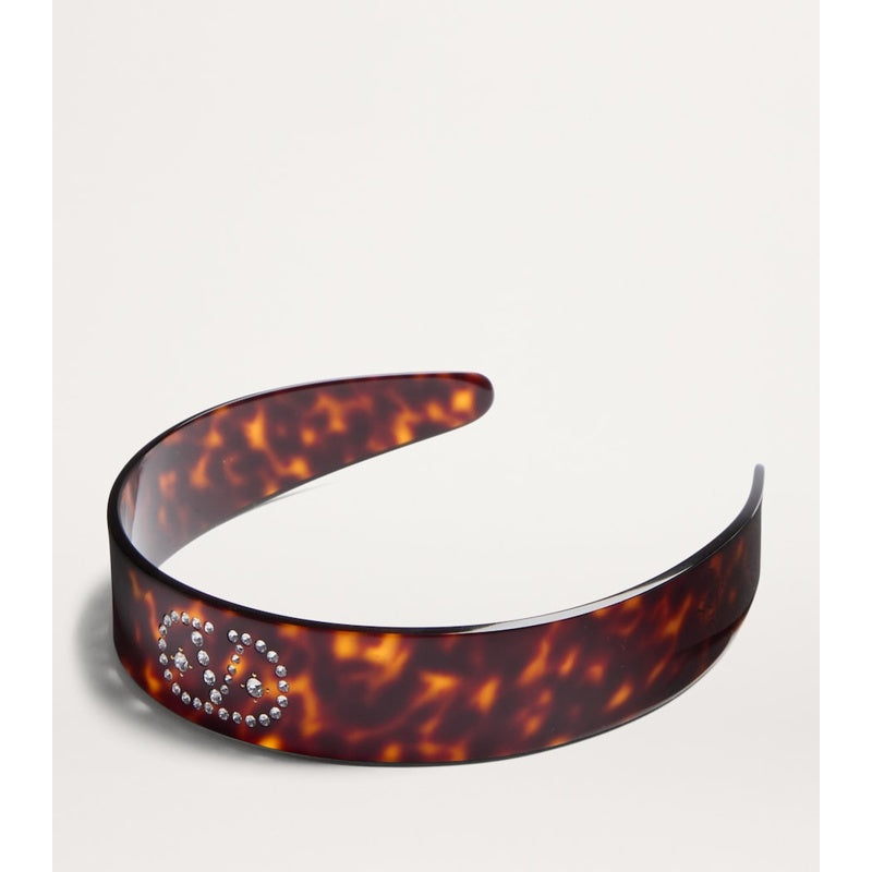 Faixa de cabeça com assinatura VLogo - Mercado de Luxo - O Maior E-Commerce de Bens, Produtos e Serviços de Luxo do Brasil.