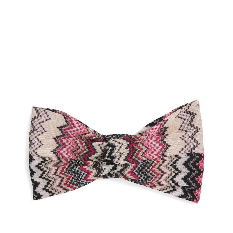 Faixa de cabeça em zigue-zague com torção frontal - Mercado de Luxo - O Maior E-Commerce de Bens, Produtos e Serviços de Luxo do Brasil.