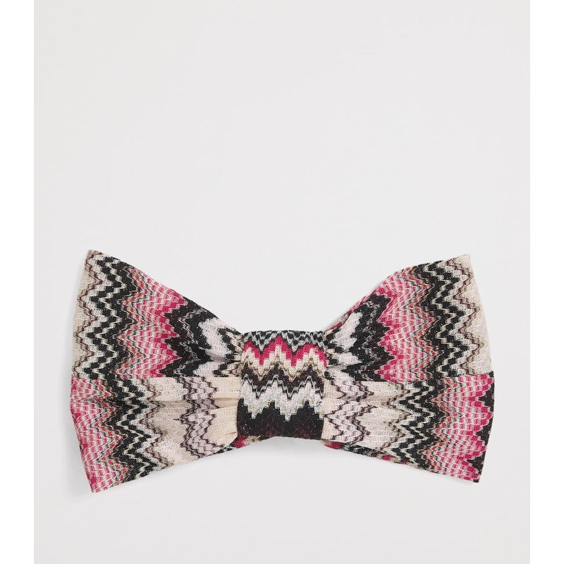 Faixa de cabeça em zigue-zague com torção frontal - Mercado de Luxo - O Maior E-Commerce de Bens, Produtos e Serviços de Luxo do Brasil.