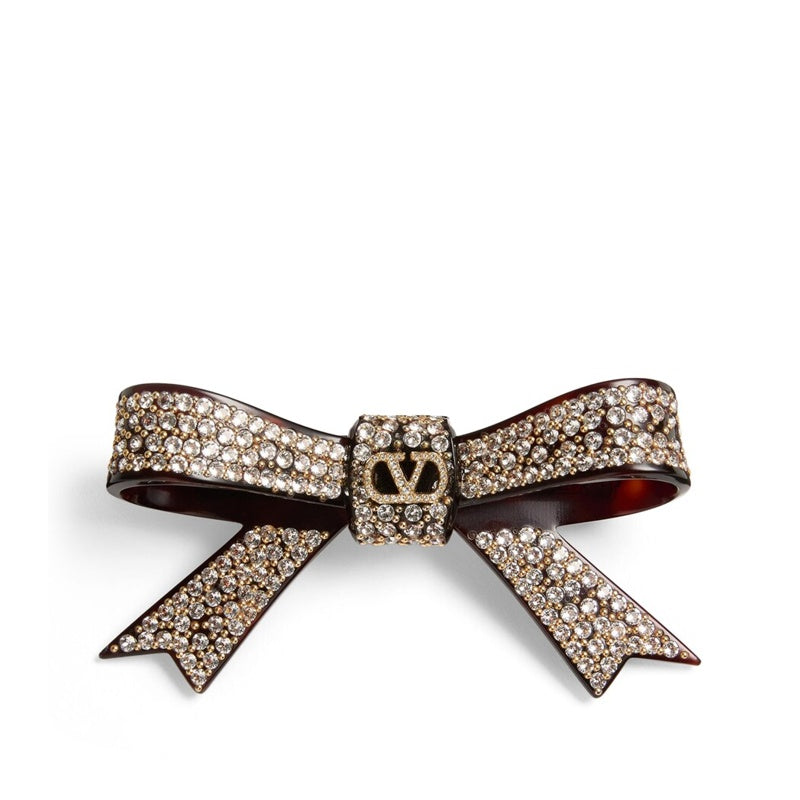 Grampo de cabelo com strass e logotipo - Mercado de Luxo - O Maior E-Commerce de Bens, Produtos e Serviços de Luxo do Brasil.