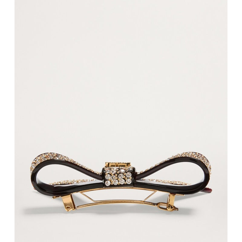 Grampo de cabelo com strass e logotipo - Mercado de Luxo - O Maior E-Commerce de Bens, Produtos e Serviços de Luxo do Brasil.