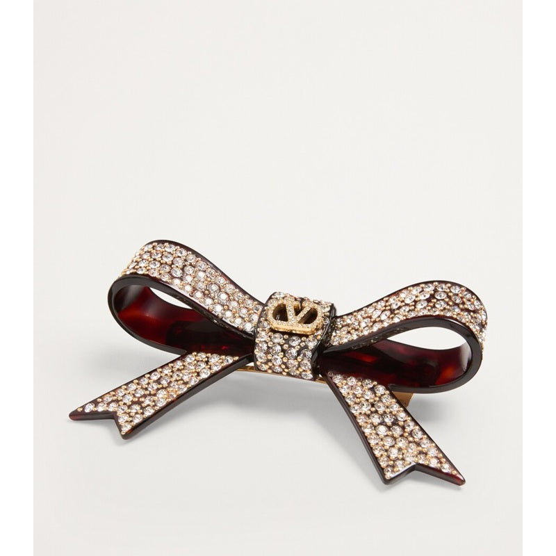 Grampo de cabelo com strass e logotipo - Mercado de Luxo - O Maior E-Commerce de Bens, Produtos e Serviços de Luxo do Brasil.