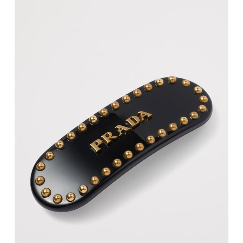 Grampo de cabelo com logotipo - Mercado de Luxo - O Maior E-Commerce de Bens, Produtos e Serviços de Luxo do Brasil.