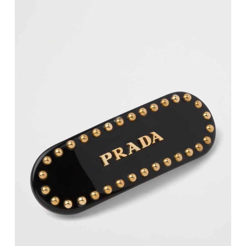 Grampo de cabelo com logotipo - Mercado de Luxo - O Maior E-Commerce de Bens, Produtos e Serviços de Luxo do Brasil.