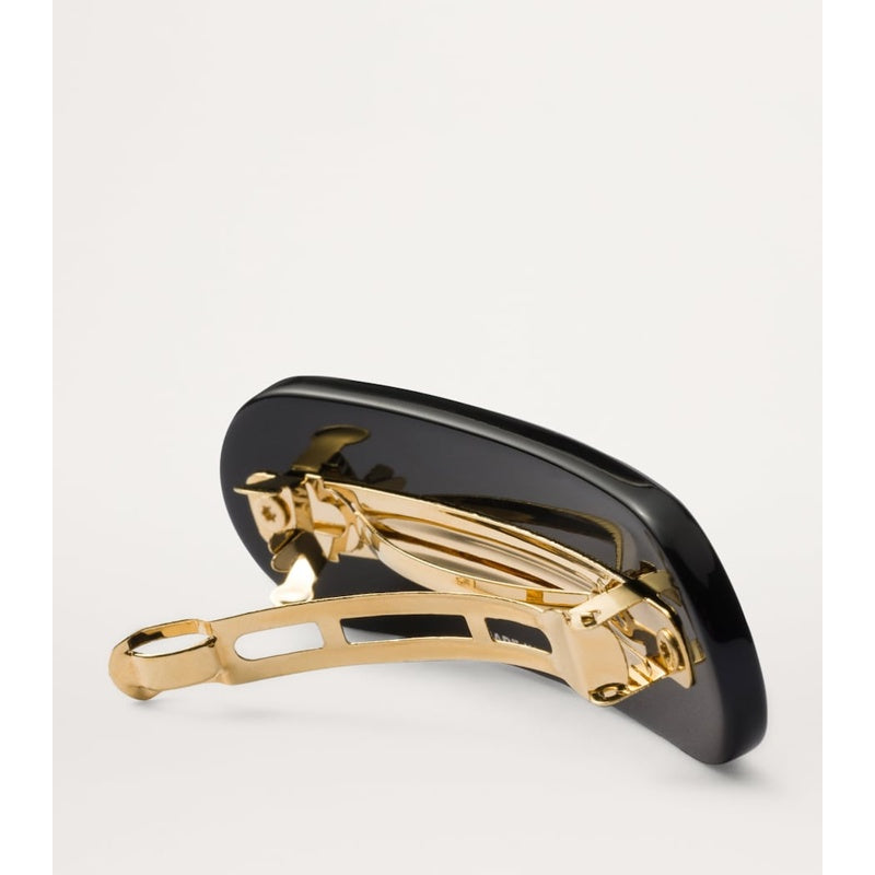 Grampo de cabelo com logotipo - Mercado de Luxo - O Maior E-Commerce de Bens, Produtos e Serviços de Luxo do Brasil.