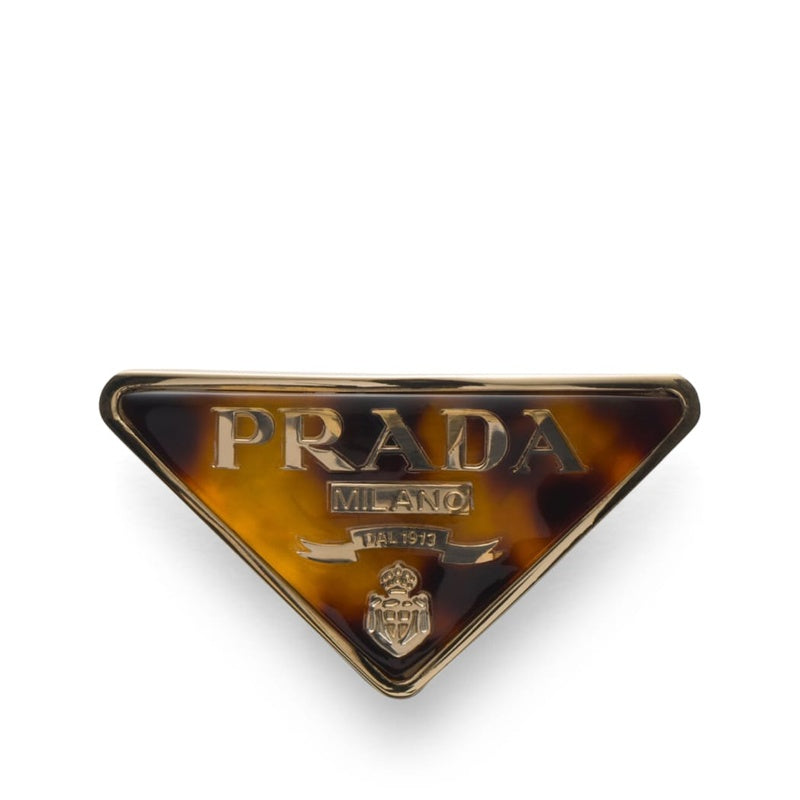 Grampo de cabelo com logotipo triangular - Mercado de Luxo - O Maior E-Commerce de Bens, Produtos e Serviços de Luxo do Brasil.