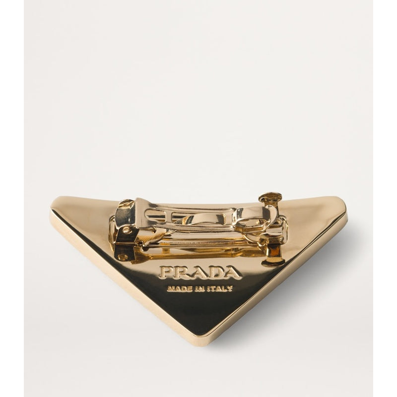 Grampo de cabelo com logotipo triangular - Mercado de Luxo - O Maior E-Commerce de Bens, Produtos e Serviços de Luxo do Brasil.