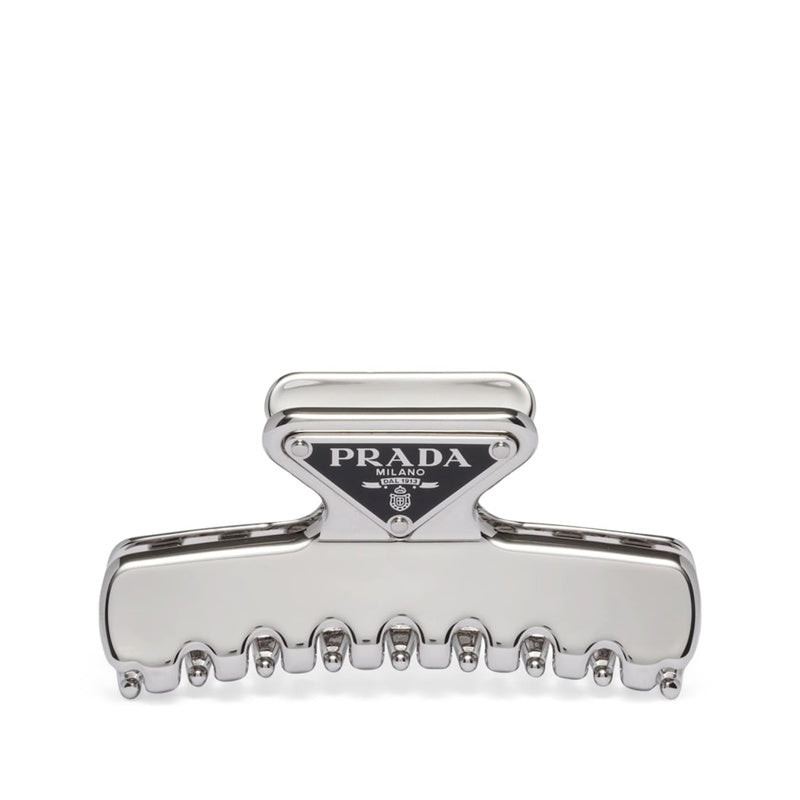 Clipe de garra com logotipo triangular - Mercado de Luxo - O Maior E-Commerce de Bens, Produtos e Serviços de Luxo do Brasil.