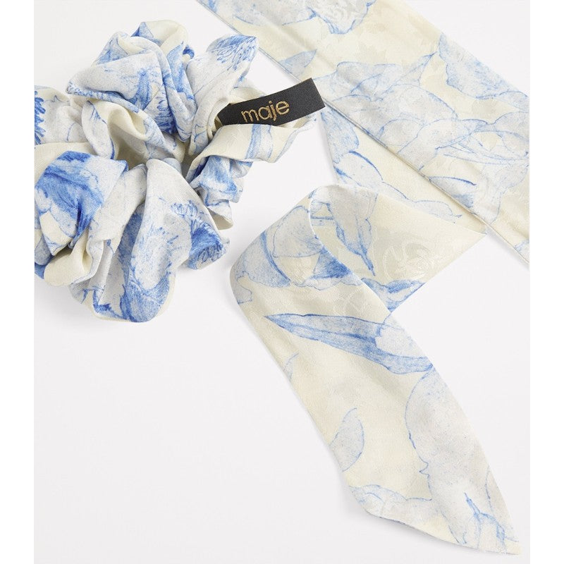 Elástico de cabelo floral - Mercado de Luxo - O Maior E-Commerce de Bens, Produtos e Serviços de Luxo do Brasil.