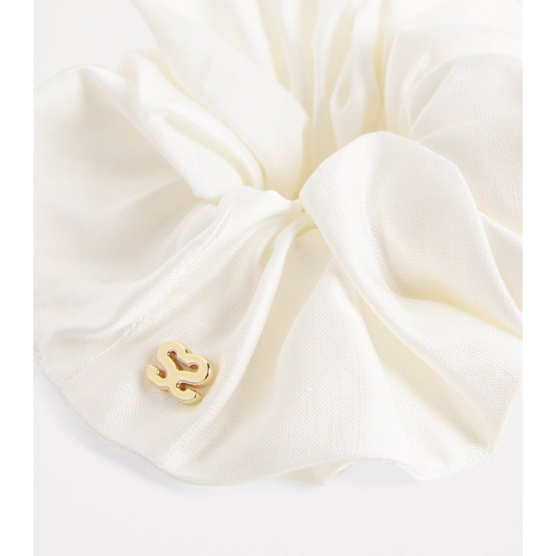 Scrunchie de cetim - Mercado de Luxo - O Maior E-Commerce de Bens, Produtos e Serviços de Luxo do Brasil.
