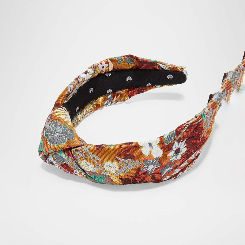 Faixa de cabeça floral de brocado com nó - Mercado de Luxo - O Maior E-Commerce de Bens, Produtos e Serviços de Luxo do Brasil.