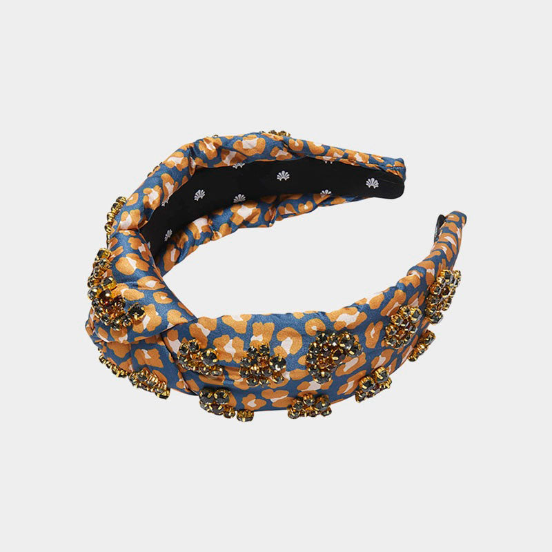 Faixa de cabeça com estampa de leopardo e nó - Mercado de Luxo - O Maior E-Commerce de Bens, Produtos e Serviços de Luxo do Brasil.