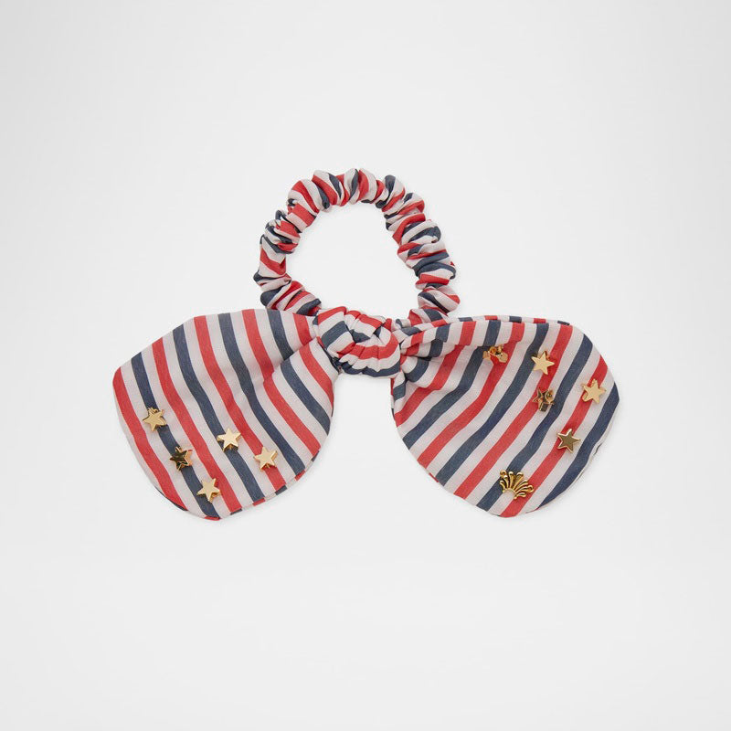 Scrunchie de algodão listrada com laço e detalhes em Penny - Mercado de Luxo - O Maior E-Commerce de Bens, Produtos e Serviços de Luxo do Brasil.