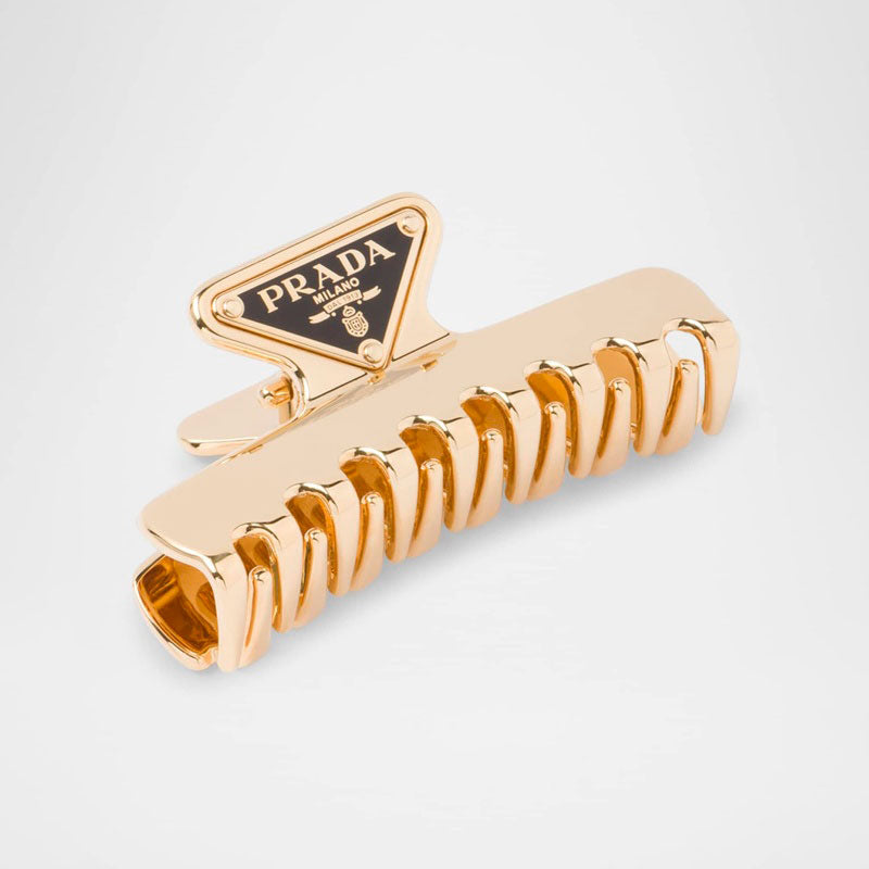 Clipe de Garra de metal triangular - Mercado de Luxo - O Maior E-Commerce de Bens, Produtos e Serviços de Luxo do Brasil.