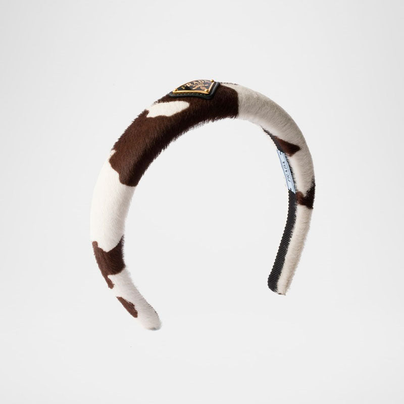 Faixa de Cabelo de bezerro com estampa de vaca - Mercado de Luxo - O Maior E-Commerce de Bens, Produtos e Serviços de Luxo do Brasil.