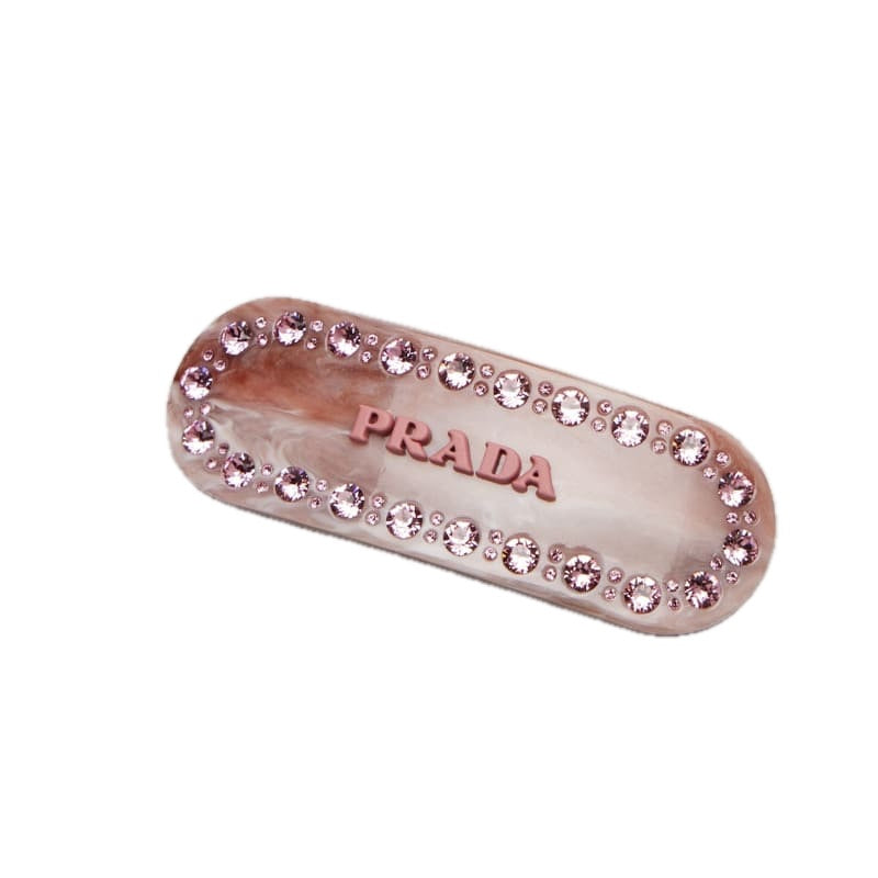 Presilha com logotipo embelezada com cristais - Mercado de Luxo - O Maior E-Commerce de Bens, Produtos e Serviços de Luxo do Brasil.