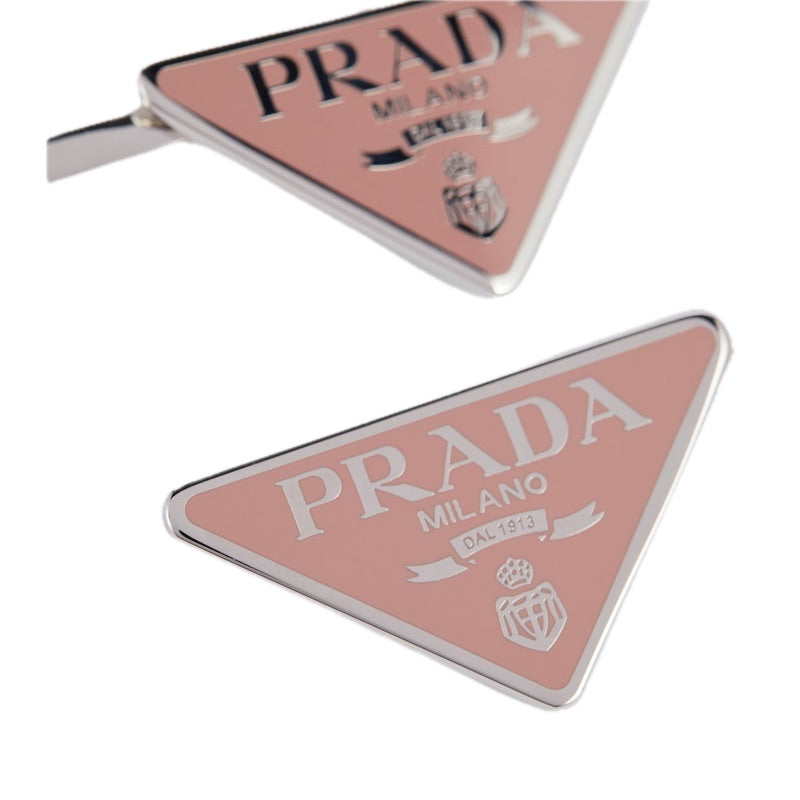 Conjunto de 2 grampos de Cabelo com logotipo - Mercado de Luxo - O Maior E-Commerce de Bens, Produtos e Serviços de Luxo do Brasil.