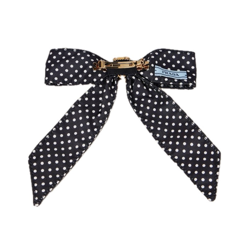Presilha de Cabelo com detalhe de laço e bolinhas - Mercado de Luxo - O Maior E-Commerce de Bens, Produtos e Serviços de Luxo do Brasil.