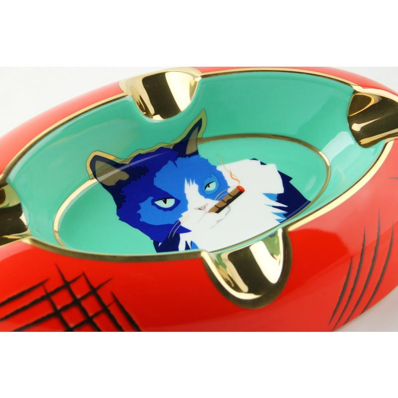 Cinzeiro Gato azul/vermelho - Mercado de Luxo - O Maior E-Commerce de Bens, Produtos e Serviços de Luxo do Brasil.