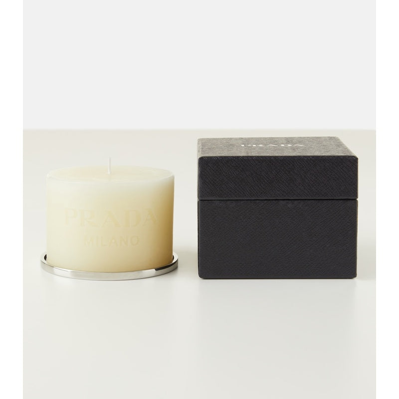 Vela com logotipo - Mercado de Luxo - O Maior E-Commerce de Bens, Produtos e Serviços de Luxo do Brasil.